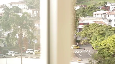 Looking out hotel window of Intercontinental Hotel in Cali, Colombia Video stock 70818489