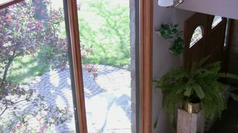 Looking out large window in home Stock Footage 576971