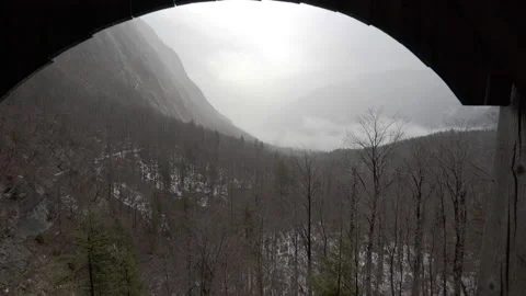 Looking out over cold and foggy mountain valley in Bohinj Slovenia Video stock 134522347