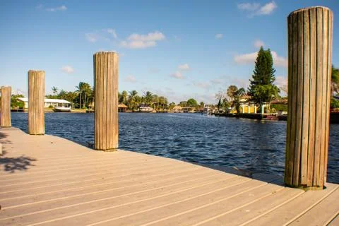 Looking Out Over a Dock in Florida at a Body of Water Stock Photos