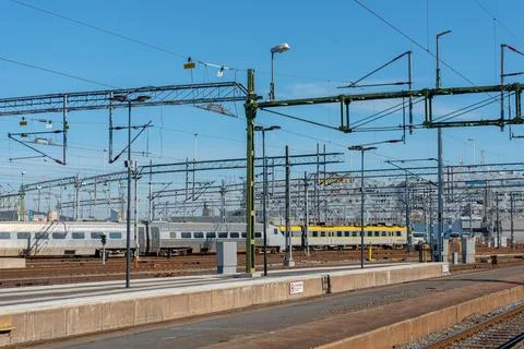 Looking out over lots of train tracks near a station.. Stock Photos