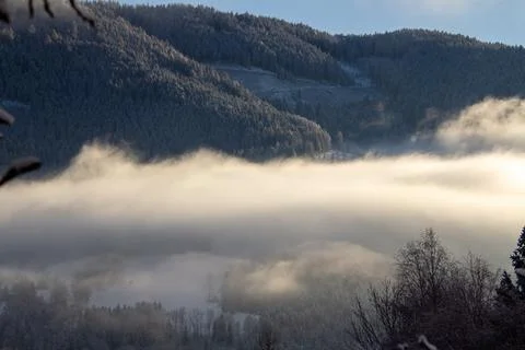 Looking out over the valley during sunrise Stock Photos
