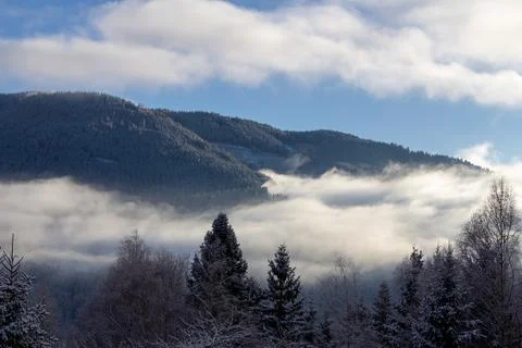 Looking out over the valley during sunrise Stock Photos