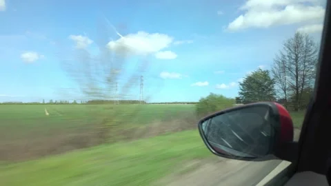 Looking out the passenger front window on the A47 Stock Footage 332846597