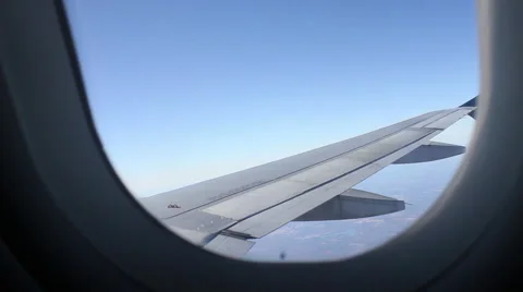 Looking out of plane window 库存影片 47788537