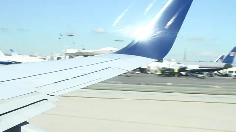 Looking out from plane window taking off. Stock Footage 55215391