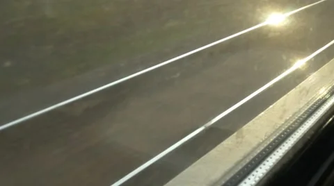 Looking out on rails of moving train window Stock Footage 43205729