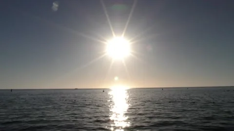 Looking out to see some mooring balls bob in the calm open ocean Stock Footage 67960097