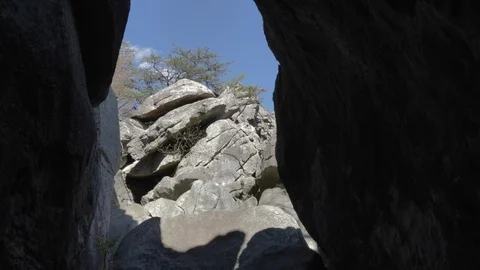 Looking Out from the Shadows at Cherokee Rock Village Stock Footage 89491739