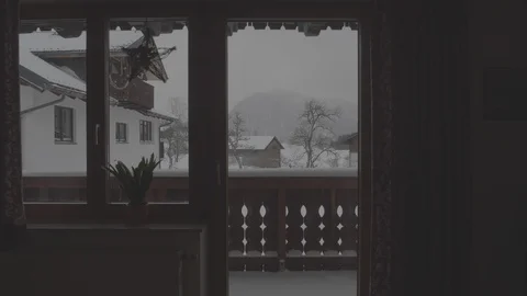 Looking out a Snowy Window 4k Stock Footage 124575730