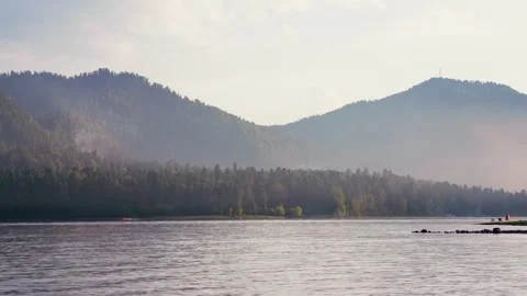 Looking out from the stern of a fast moving motor boat to it's large bright Stock Footage 278000295