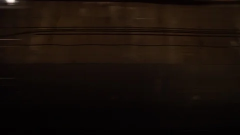 Looking out subway window atmospheric, dark tunnels and graffiti, NYC Stock Footage 99041831