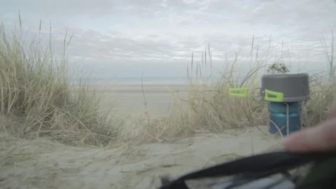 Looking out of a tent at the ocean Stock Footage 72713245