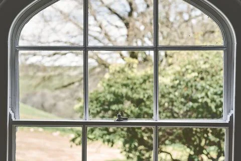 Looking Out Through Vintage Window At Countryside Foto stock