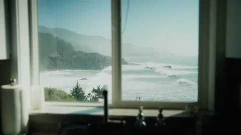 Looking Out at a Wavy Sea Through a Window – Poetic Ocean View Stock Footage 315098991