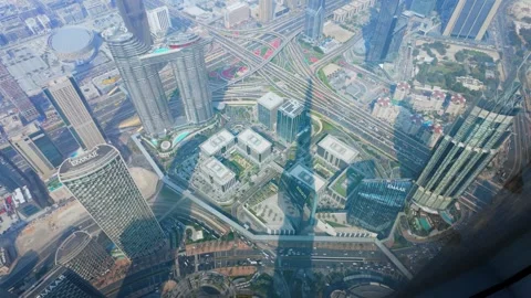 Looking out the window of the Burj Khalifa skyscraper in Dubai, UAE Stock Footage 301544383
