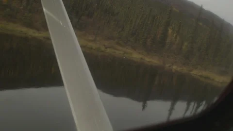 Looking Out Window Landing Float Plane in Alatna River Valley Stock Footage 121640321