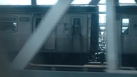 Looking out the window of a New York City subway train in motion Video stock 121697256