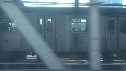 Looking out the window of a New York City subway train in motion Video stock 121697258