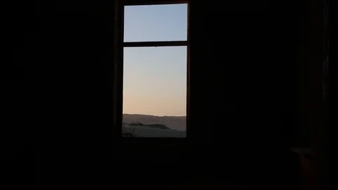Looking out of window of old abandoned house in Namib desert, Namibia Stock Footage 102740709