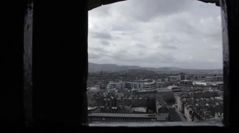 Looking out of a window over the city Stock Footage 51733039