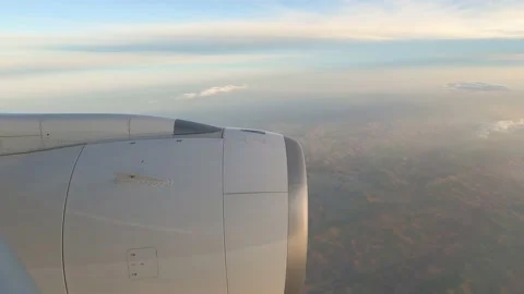 Looking out the window of a passenger jet airplane while flying over Brazil show Stock Footage 204881238