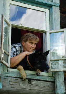 Looking out of the window Stock Photos