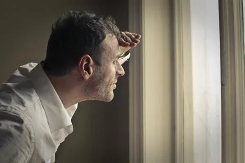 Looking out the window Stock Photos