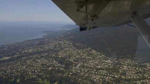 Looking Out the Window of a Plane Stock Footage 23529698