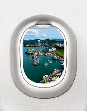 Looking out the window of a plane to the harbor in Batumi Stock Photos
