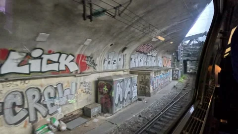 Looking out of the window of an SNCF train traveling through Paris passing Video stock 247622849