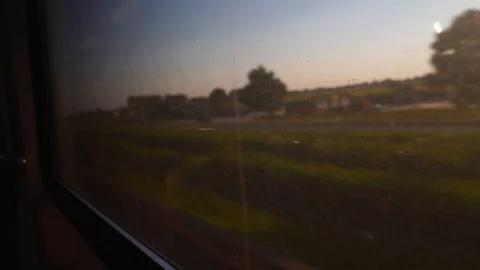 Looking out Window in Train - Golden Hour Stock Footage 91780295
