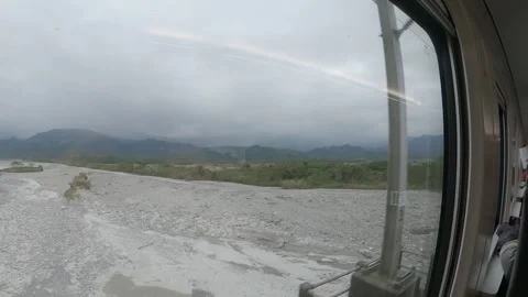 Looking out window train journey Taiwan Stock Footage 235170212