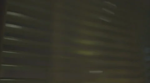 Looking outside the apartment window at night Vídeo Stock 67342221