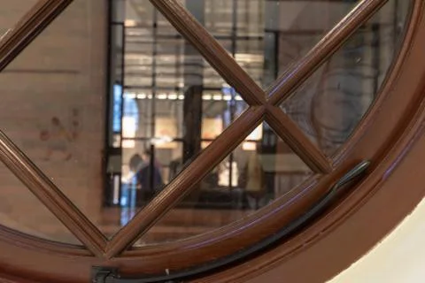 Looking outside the window grille Stock Photos