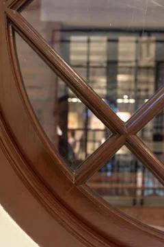 Looking outside the window grille Foto stock