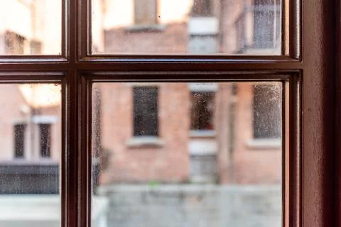 Looking outside the window grille Stock Photos