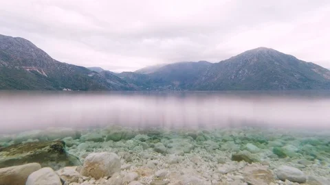 Looking over and under the water Stock Footage 129749353