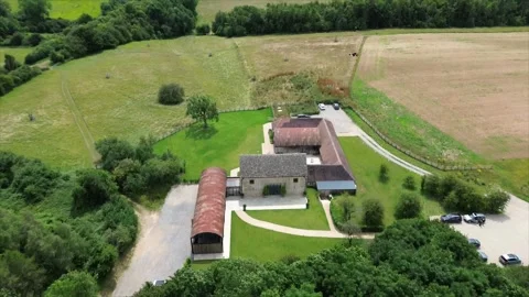 Looking Over A Converted Barn In The Cotswolds To Reveal English Countryside Video stock 246326720