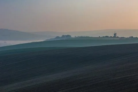 Looking over fields in the South Downs on a winter's morning Stock Photos