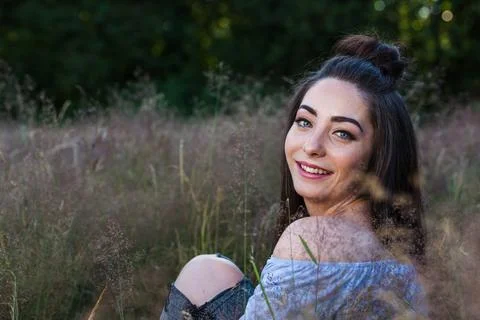 Looking over her shoulder Stock Photos