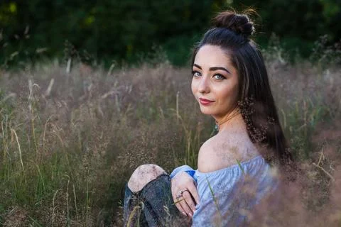 Looking over her shoulder Stock Photos