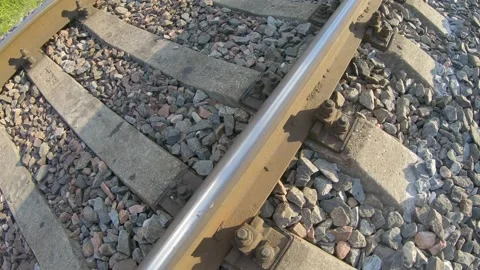 Looking Over a Railroad With Power Lines and Industrial District 4k60fps Stock Footage 135634140