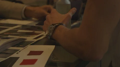 Looking Over Styles and Designs For Dress Suit Stock Footage 118095659