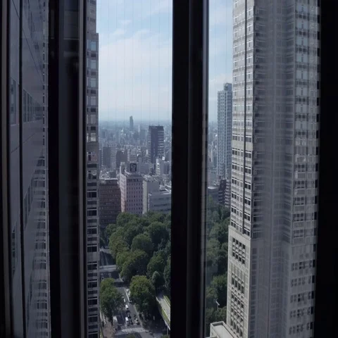 Looking over view of Tokyo from the elevator going up Stock Footage 69553073