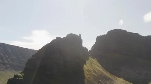 Looking up at the peak of Svalvogar mountain in Iceland on a bluebird Stock-Footage 255014408