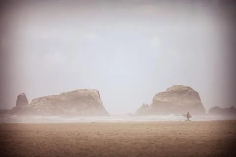 Looking for the perfect wave to surf Stock Photos