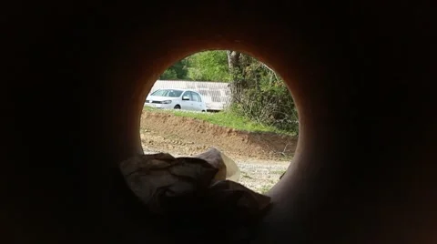 Looking from a pipe 動画素材 62643296
