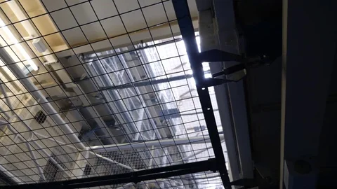 Looking up from Prison Stock Footage 82460868