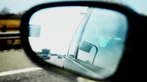 Looking into rear view mirror Stock Footage 50528518